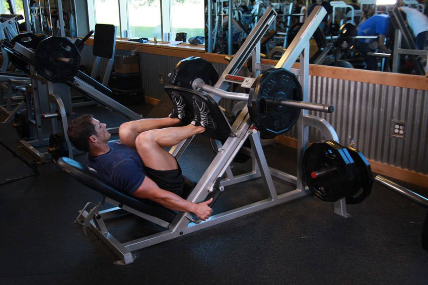 Leg Press (feet mid-to-high on platform) — End